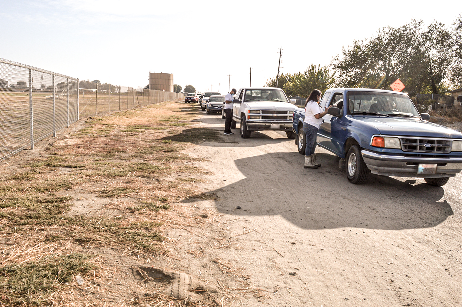 Farmworkers line up to receive care packages